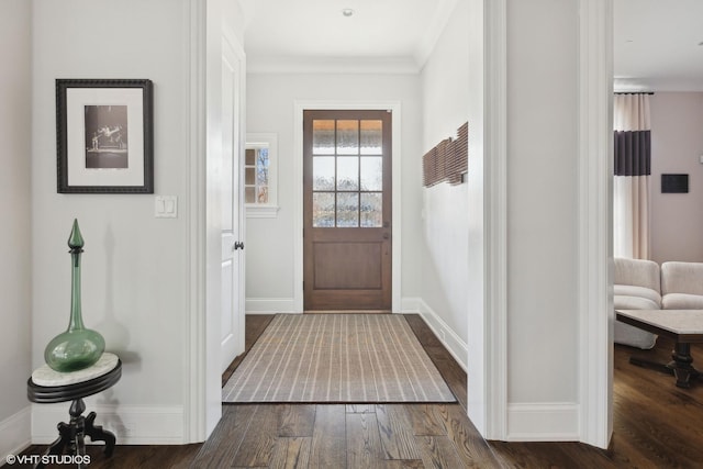 entryway featuring crown molding and dark hardwood / wood-style floors