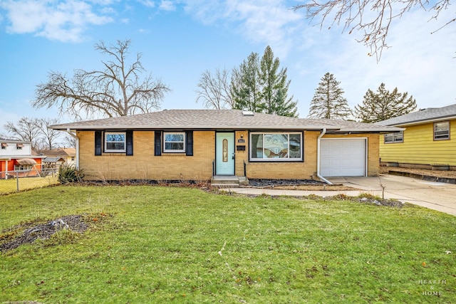 single story home with a garage and a front yard