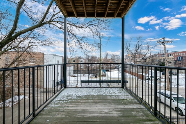 view of snow covered deck