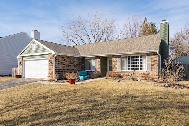 ranch-style home featuring brick siding, a front yard, roof with shingles, a chimney, and an attached garage