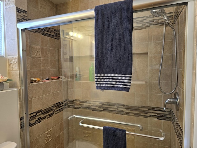 bathroom with an enclosed shower