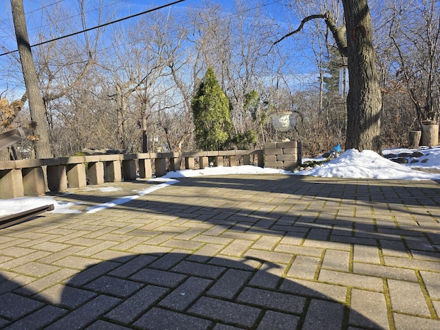 view of snow covered pool