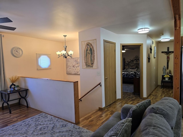 living room with hardwood / wood-style flooring and ceiling fan