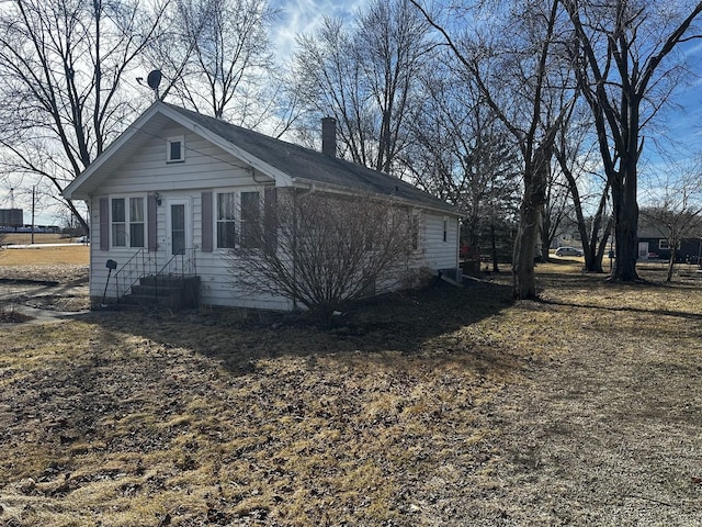 view of front of house with a chimney