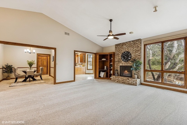 living area featuring visible vents, carpet floors, a fireplace, high vaulted ceiling, and ceiling fan with notable chandelier