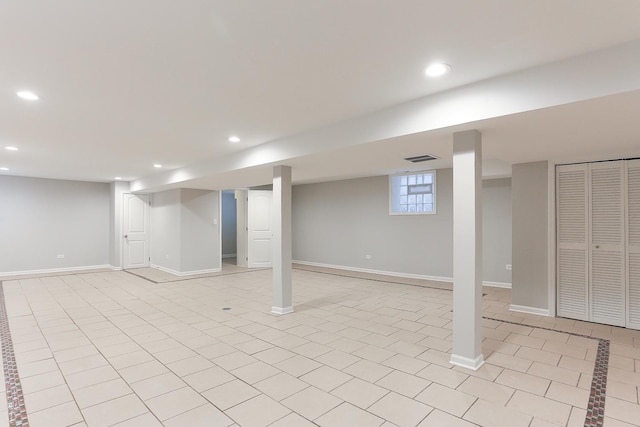 basement with light tile patterned floors