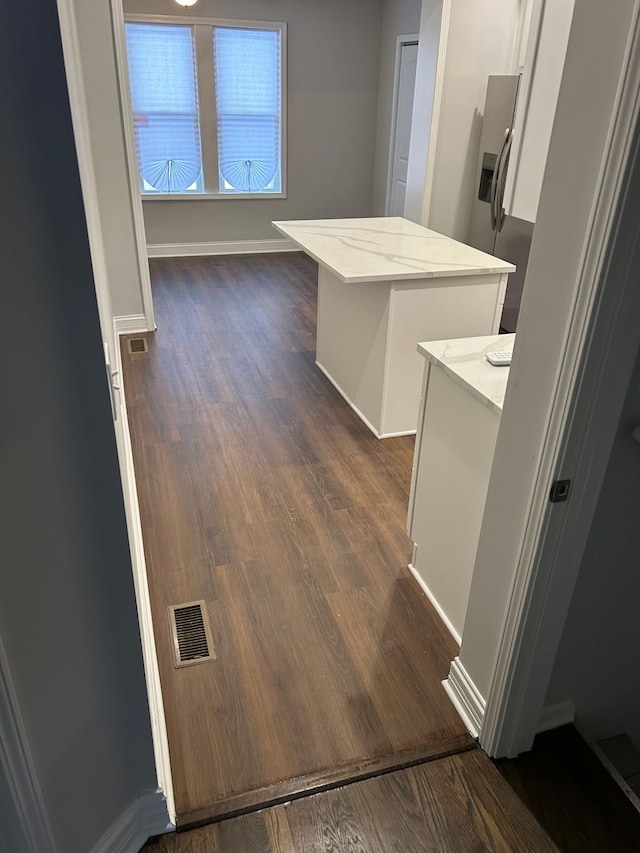 washroom featuring dark wood-type flooring