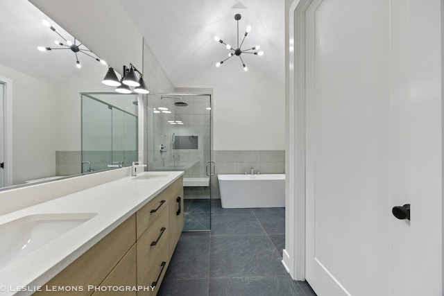 bathroom with lofted ceiling, vanity, a notable chandelier, tile patterned floors, and independent shower and bath