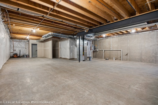 basement featuring heating unit