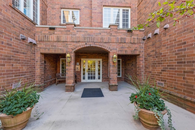 doorway to property featuring a patio area and french doors