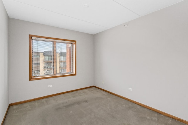 unfurnished room featuring carpet floors