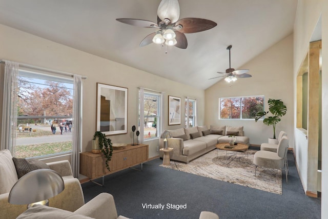 carpeted living room featuring ceiling fan and vaulted ceiling