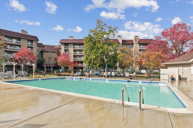 view of pool featuring a patio area