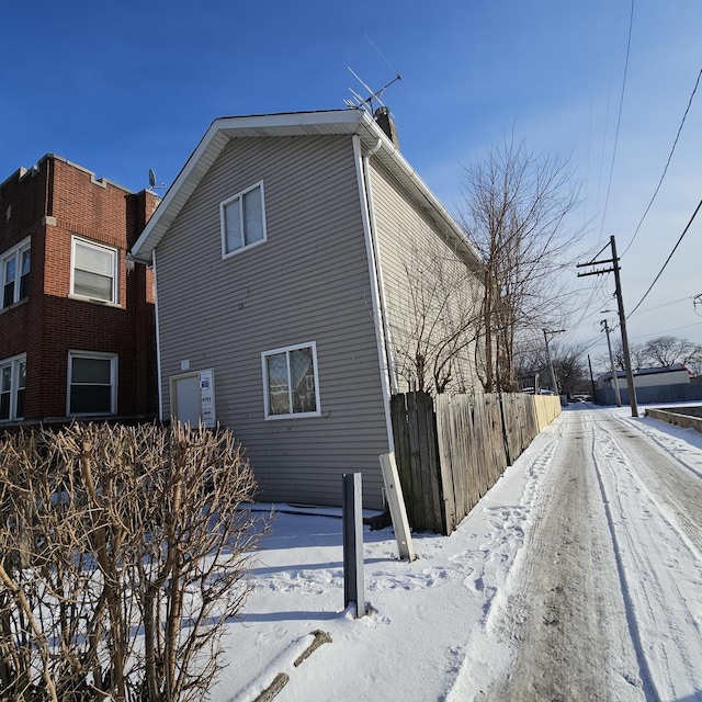 view of snow covered property