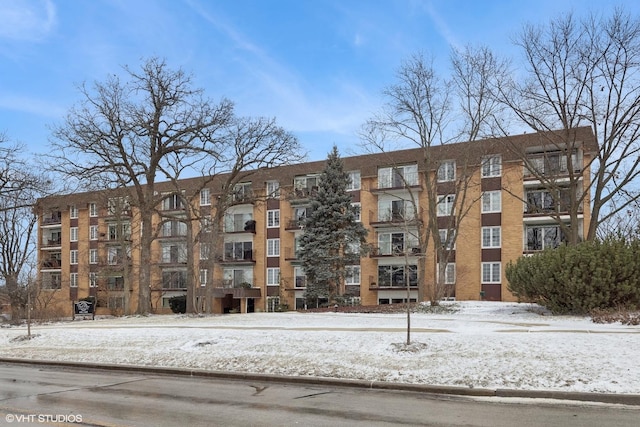 view of snow covered property