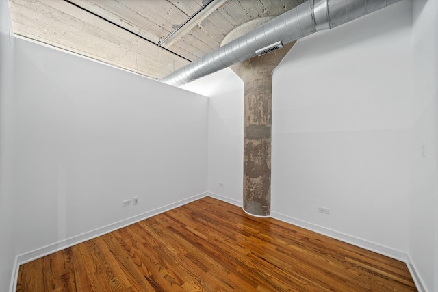 1150 W 15th St Unit 232, Chicago, IL 60608 - unfurnished room featuring hardwood / wood-style floors