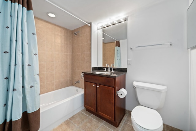 1150 W 15th St Unit 232, Chicago, IL 60608 - full bathroom with tile patterned floors, toilet, shower / tub combo, and vanity