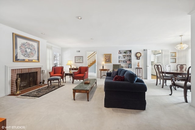 267 Merton Ave, Glen Ellyn, IL 60137 - living area with stairway, light carpet, a fireplace, and built in features