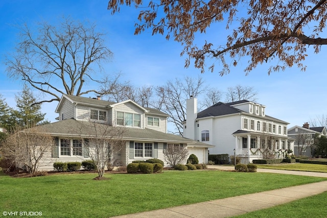 267 Merton Ave, Glen Ellyn, IL 60137 - traditional-style house with concrete driveway, a front yard, and a chimney