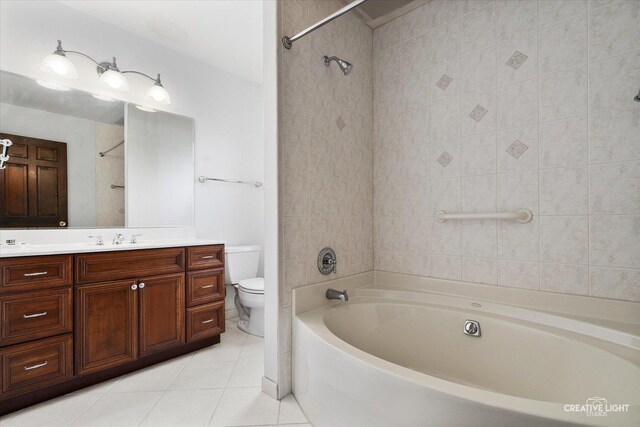 full bathroom featuring tile patterned floors, toilet, vanity, and shower / washtub combination