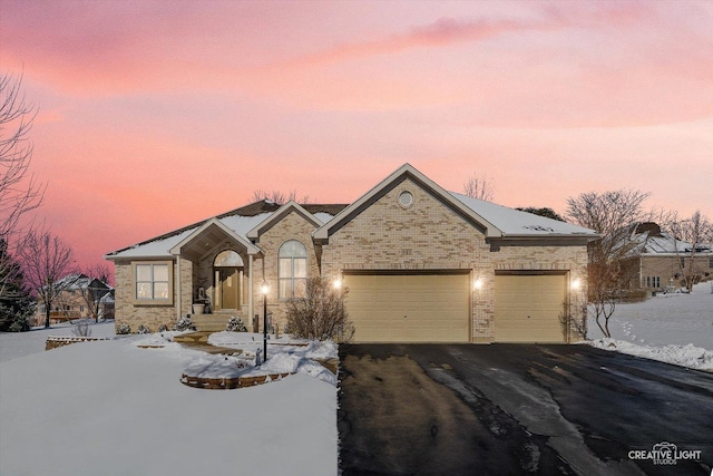 ranch-style home with a garage