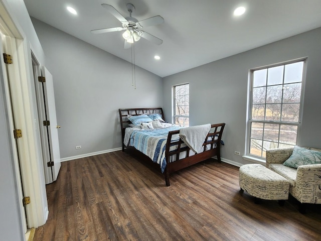 bedroom with lofted ceiling, recessed lighting, baseboards, and wood finished floors