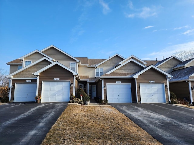 view of front of property featuring a garage and driveway