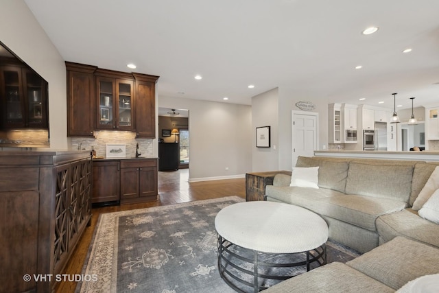 living room featuring dark hardwood / wood-style floors