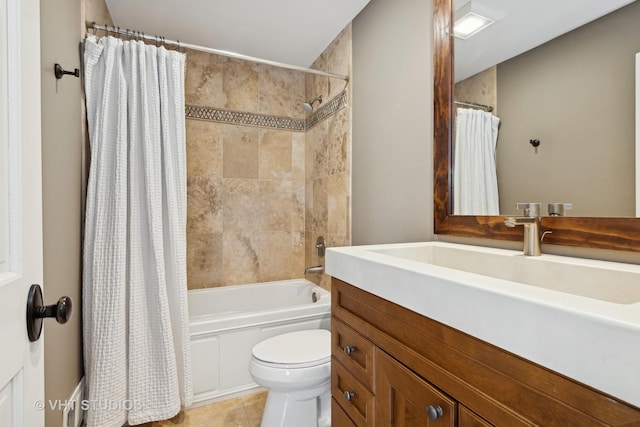 full bathroom with tile patterned flooring, shower / bath combo, vanity, and toilet