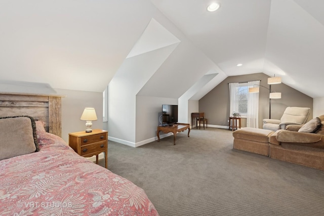 bedroom featuring lofted ceiling and carpet flooring