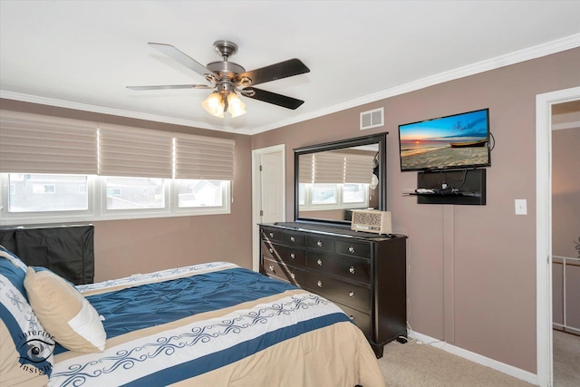 bedroom with ornamental molding, visible vents, light carpet, and multiple windows