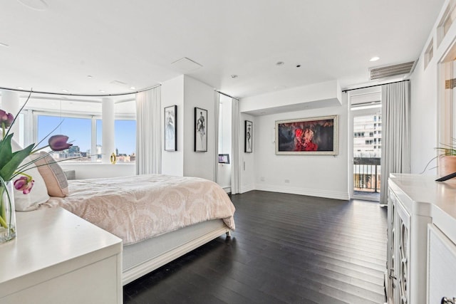 bedroom with visible vents, baseboards, recessed lighting, dark wood-style flooring, and access to exterior