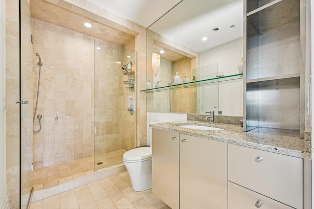 full bathroom featuring vanity, toilet, recessed lighting, and a stall shower