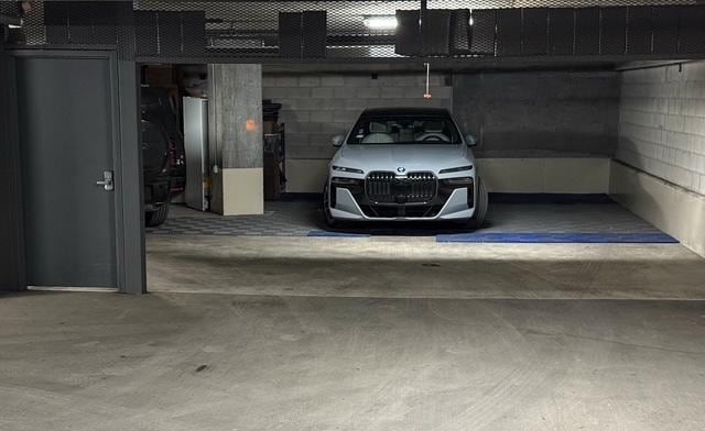 parking garage featuring concrete block wall