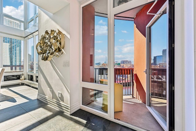 entryway with a view of city and baseboards