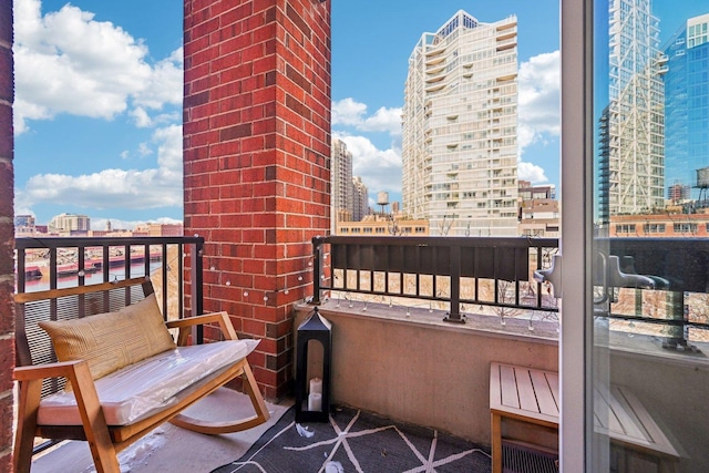 balcony featuring a city view