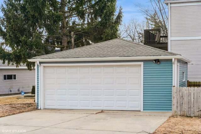 detached garage with fence