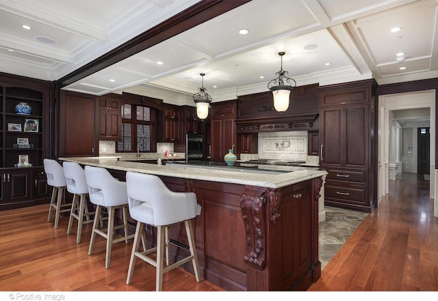 kitchen with coffered ceiling, crown molding, backsplash, and dark wood-type flooring