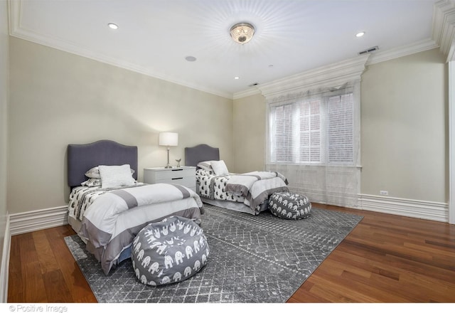 bedroom with visible vents, wood finished floors, and recessed lighting