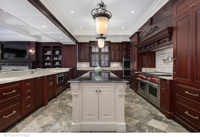 kitchen with range with two ovens, reddish brown cabinets, tasteful backsplash, and a center island