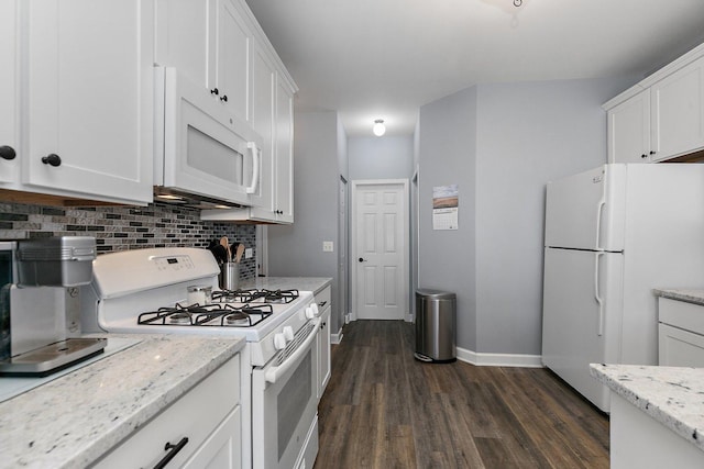 kitchen with white cabinets and white appliances