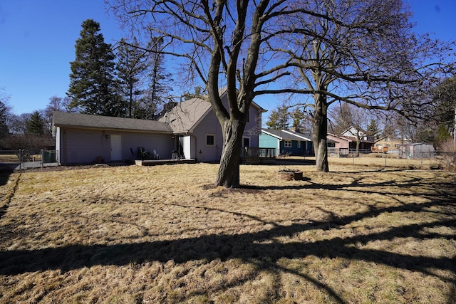 view of side of property with fence