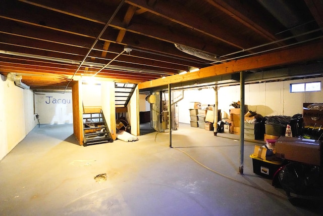 basement featuring heating unit