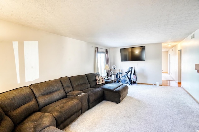 carpeted living area featuring a textured ceiling, visible vents, and baseboards