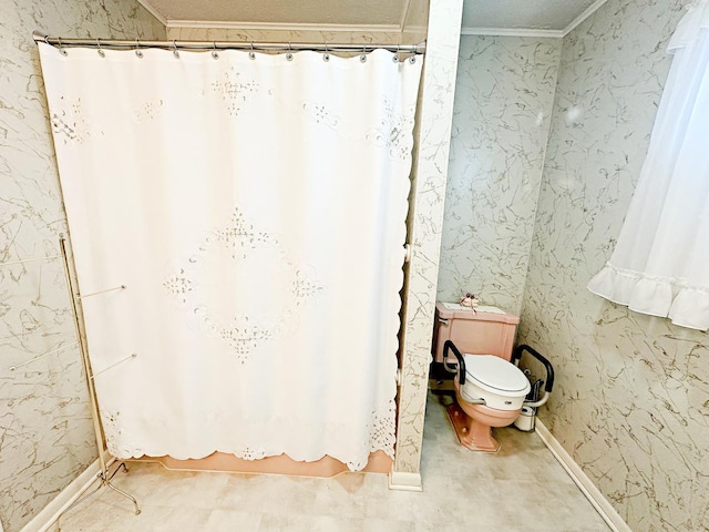 full bathroom featuring toilet and ornamental molding