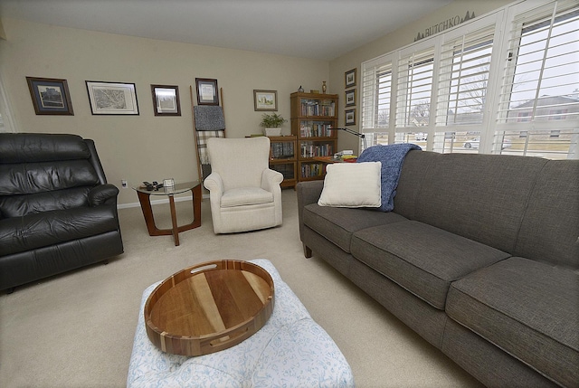 living room with carpet flooring and baseboards