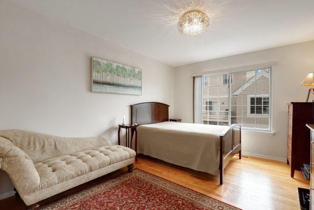 bedroom featuring light wood-type flooring