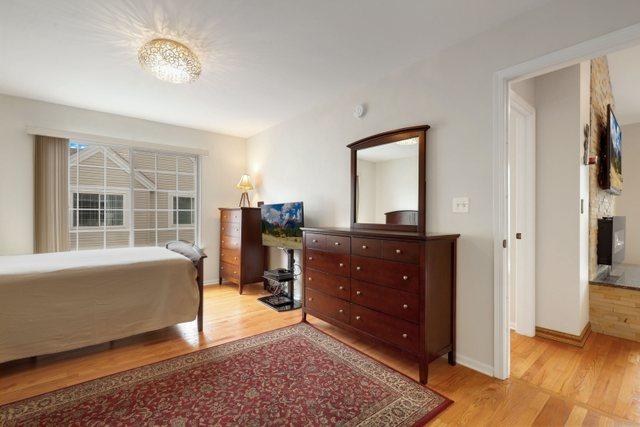 bedroom with light wood-type flooring