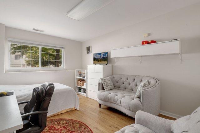 bedroom featuring hardwood / wood-style floors