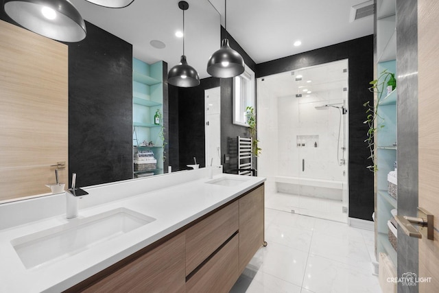 bathroom featuring vanity and walk in shower